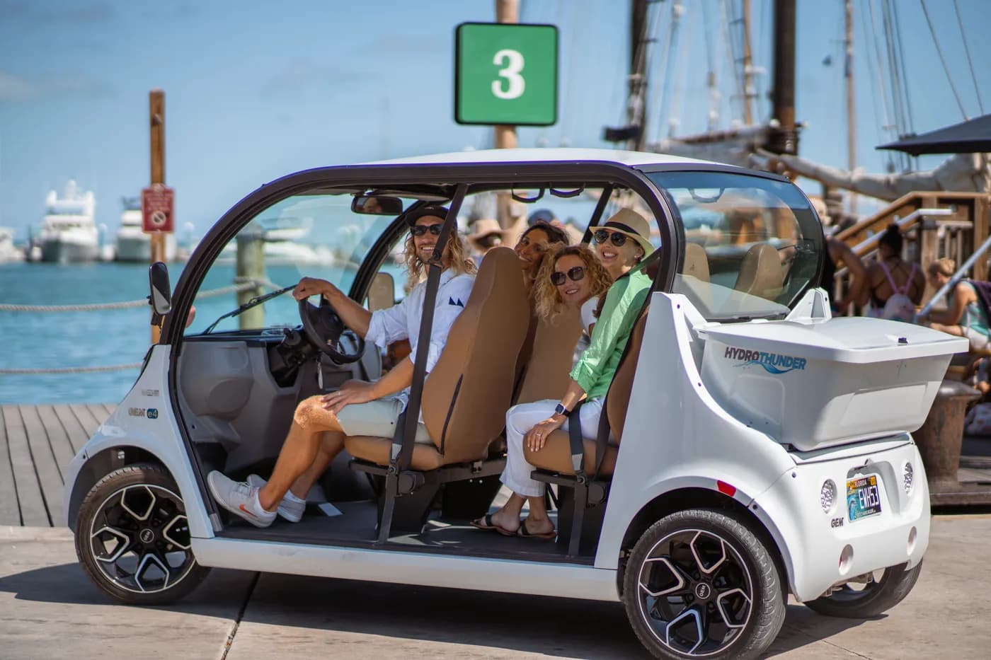 Group enjoying an electric car rental in Key West